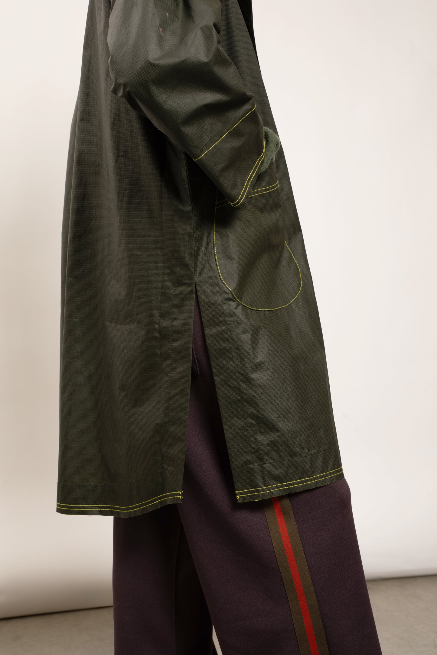 BICOLORED RAINCOAT GREEN