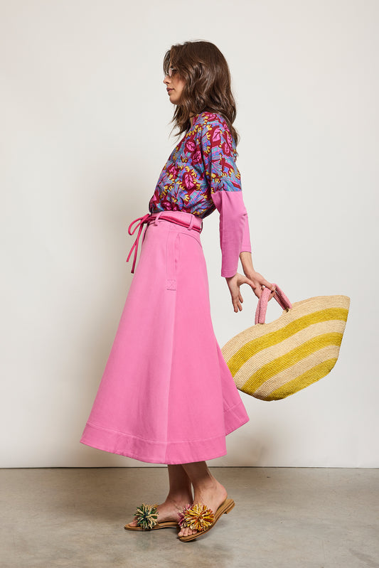 JUPE À ŒILLETS ROSE