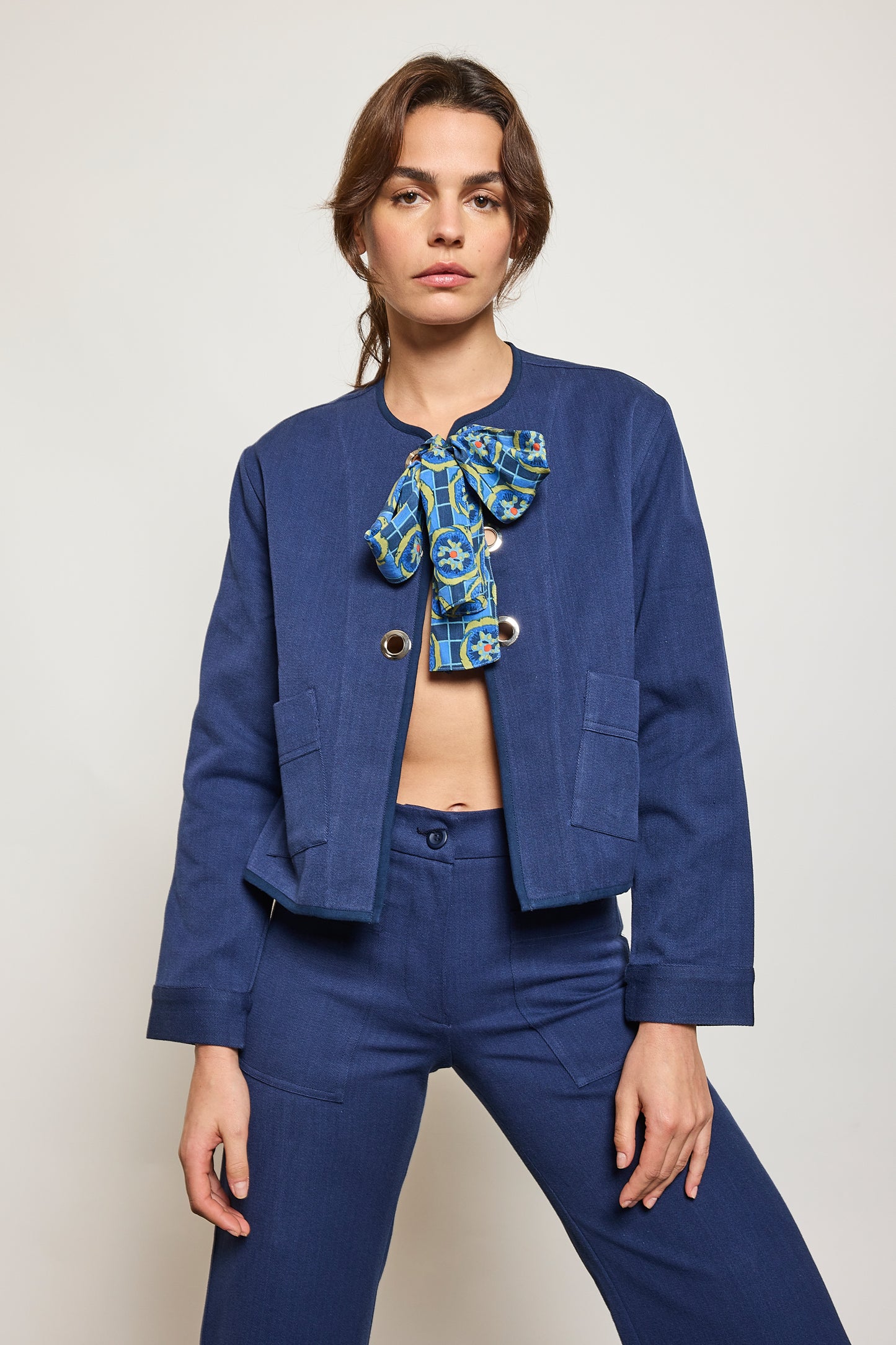 VESTE À ŒILLETS MARINE