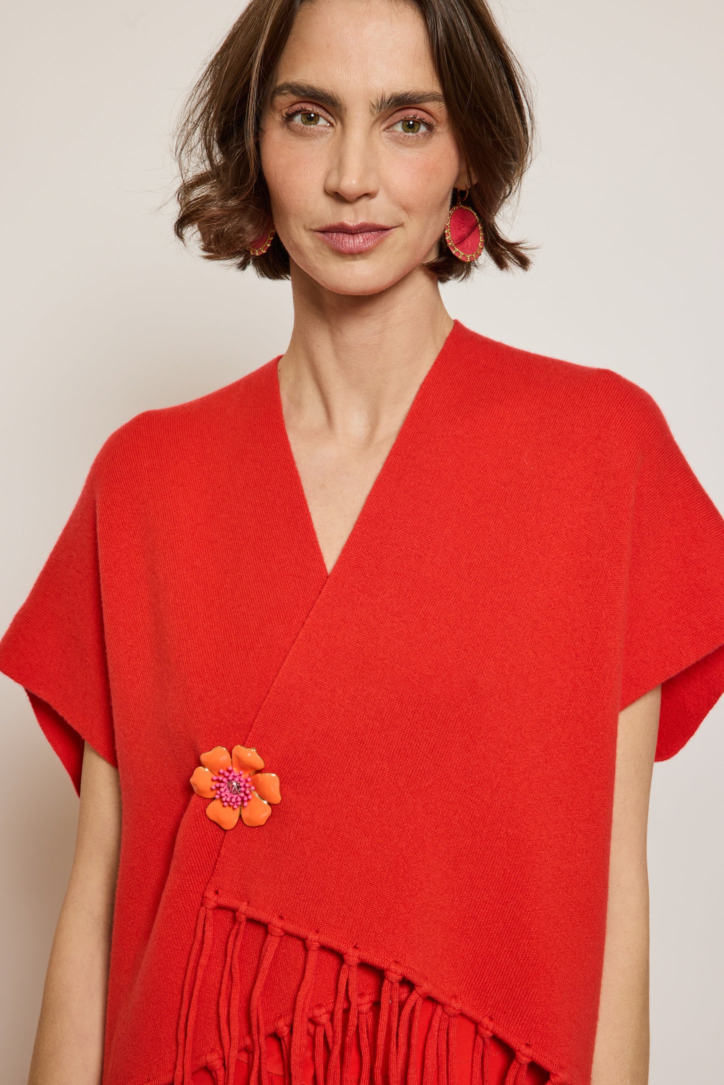 CARDIGAN À FRANGES CORAIL