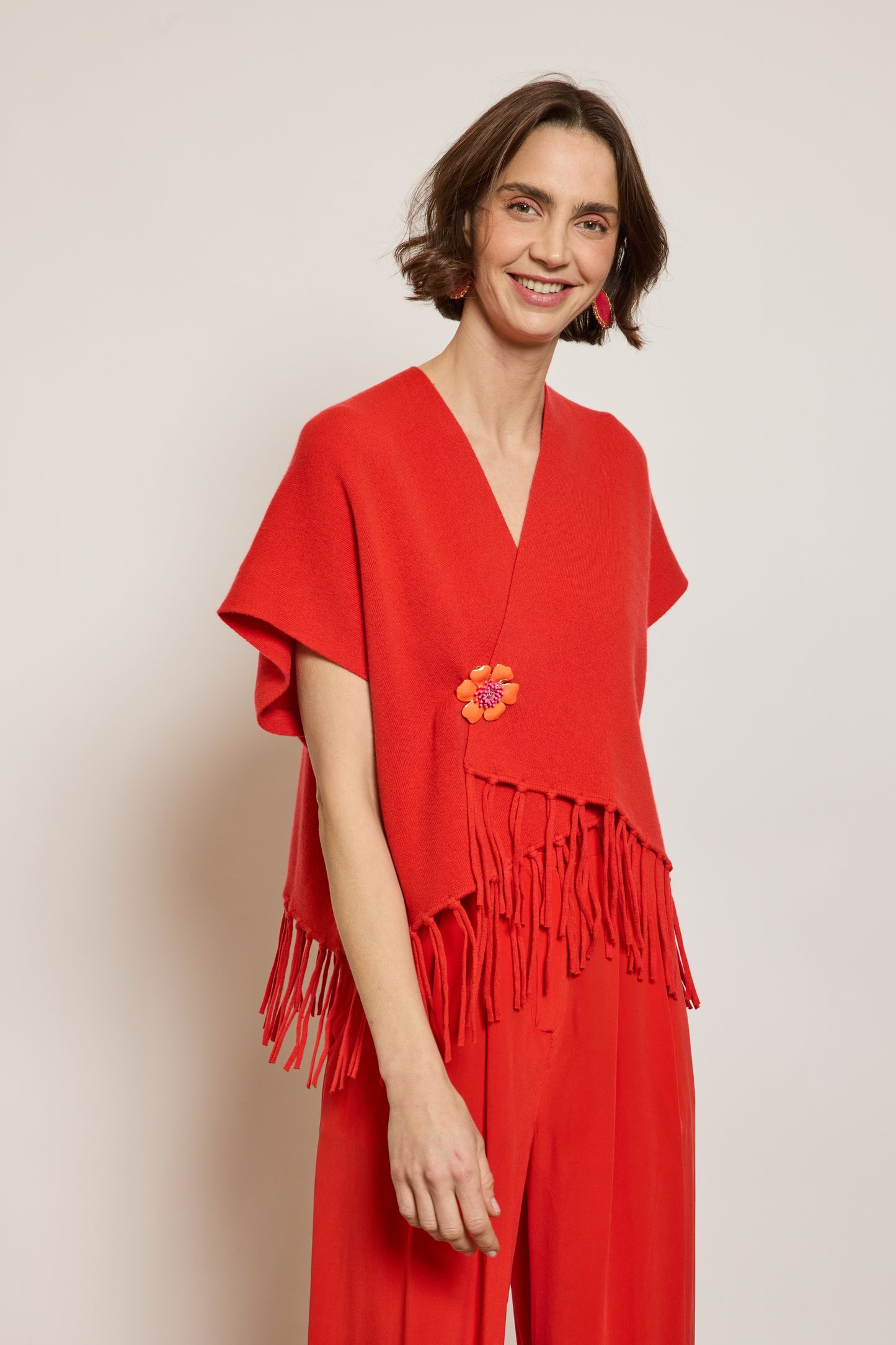 CARDIGAN À FRANGES CORAIL