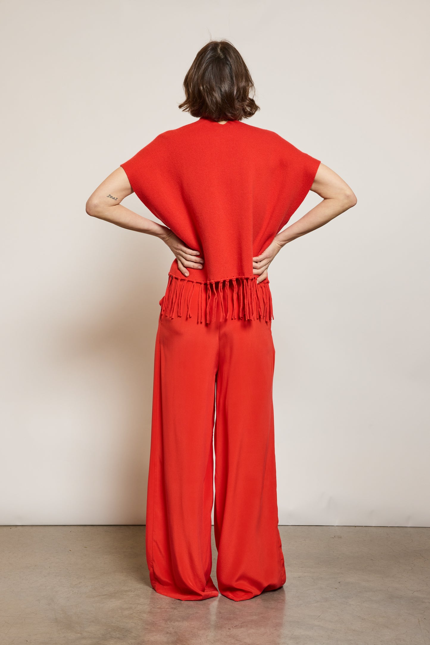 CARDIGAN À FRANGES CORAIL