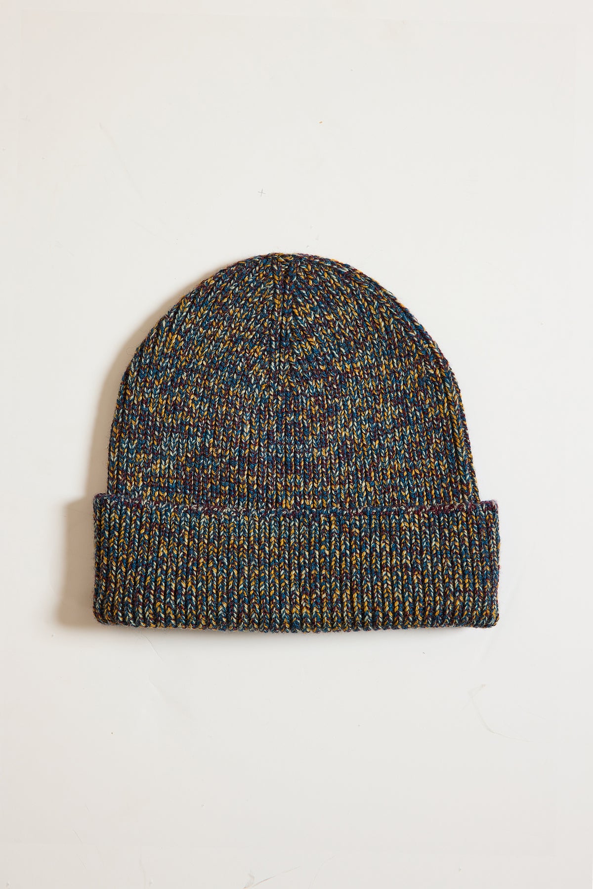 BONNET EN LAINE PÉTROLE