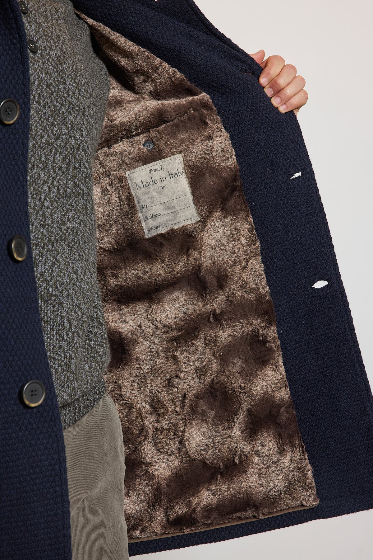 MANTEAU EN CAVIAR DE LAINE MARINE