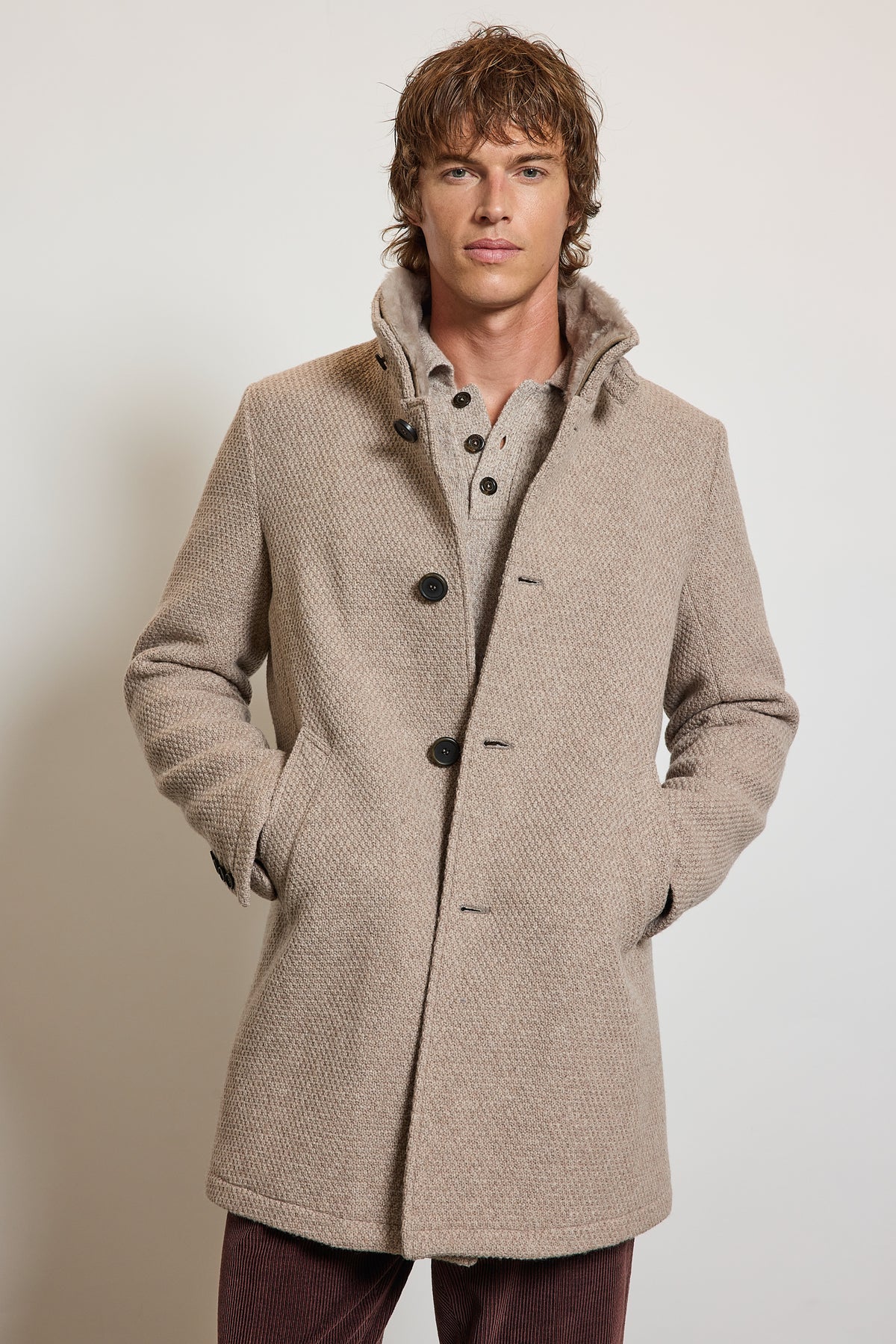 MANTEAU EN CAVIAR DE LAINE SABLE