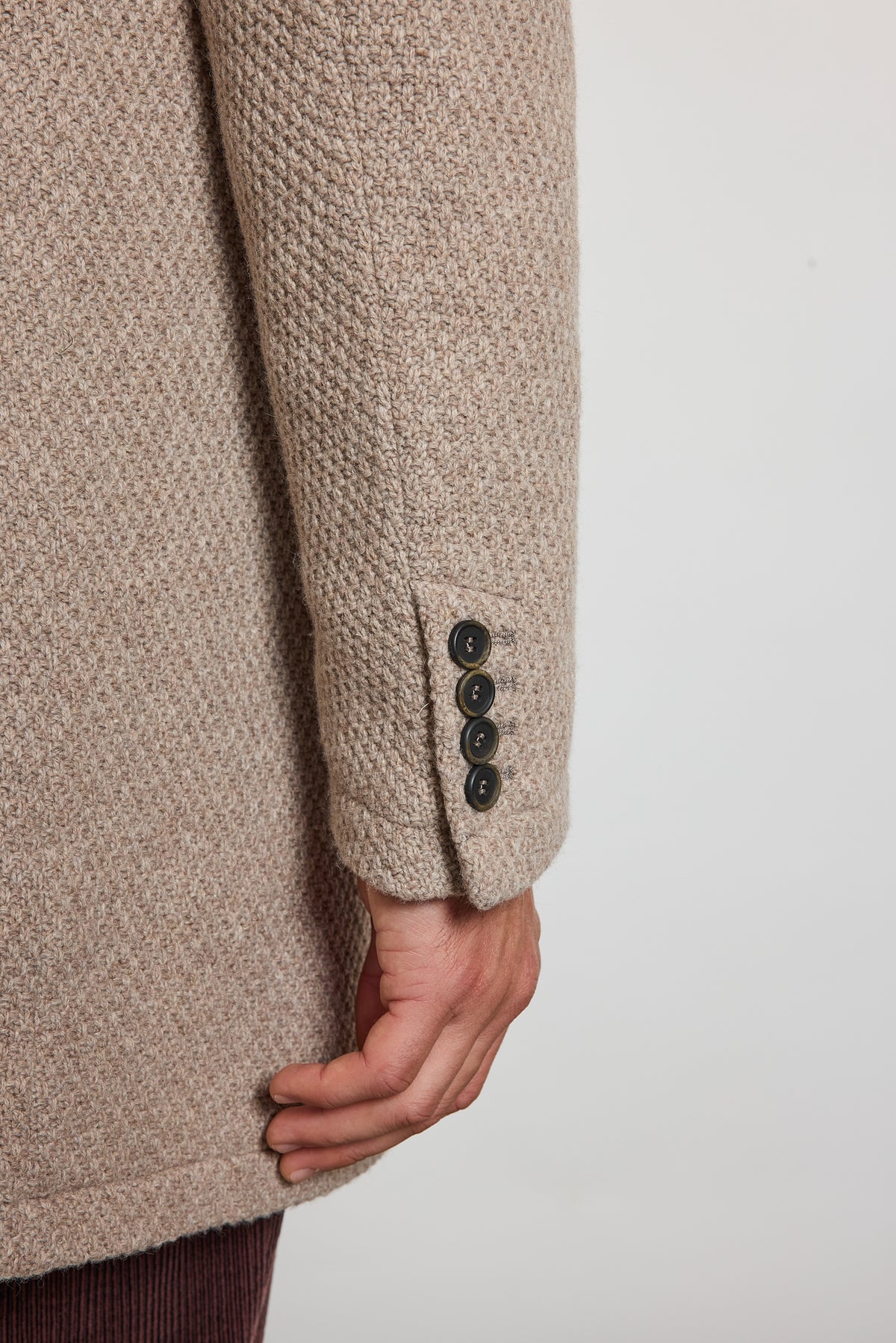 MANTEAU EN CAVIAR DE LAINE SABLE